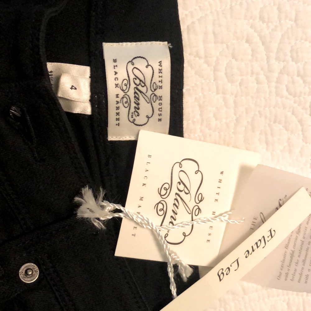New WHBM black jeans. Size 4. Embellished front / back pockets. Tags on